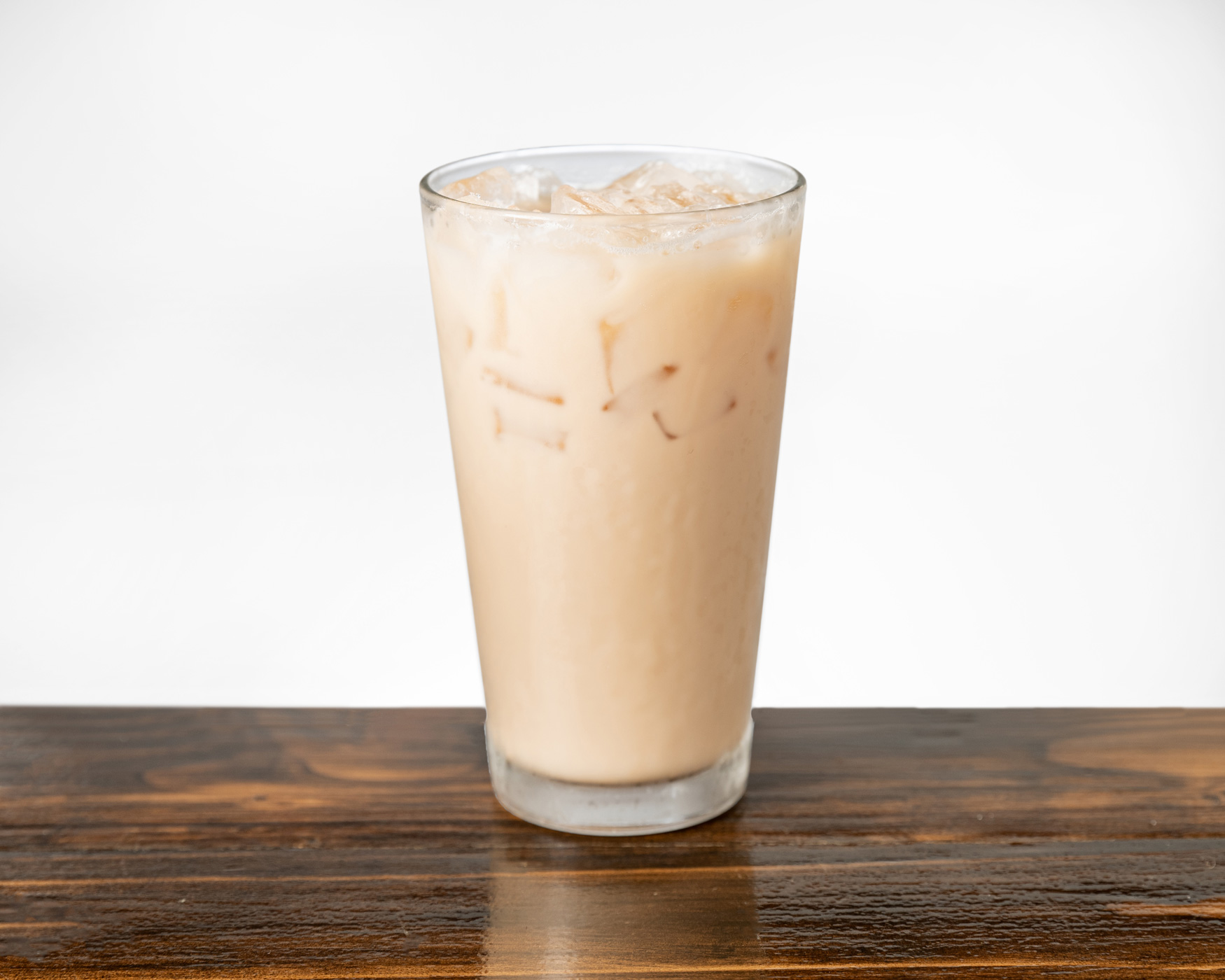 Tall glass of fresh horchata served over ice